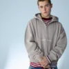 Boxy Fit -mallinen lyhyt vetoketjullinen huppari, jossa painatus – Collegepaidat ja hupparit