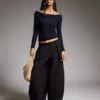 Tekniset laskostetut housut